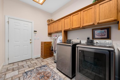 Stunning Custom Home with Long-Range Mountain Views on the on Ridges Golf and Country Club in Tennessee - for sale on GolfHomes.com, golf home, golf lot
