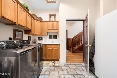 Stunning Custom Home with Long-Range Mountain Views on the on Ridges Golf and Country Club in Tennessee - for sale on GolfHomes.com, golf home, golf lot