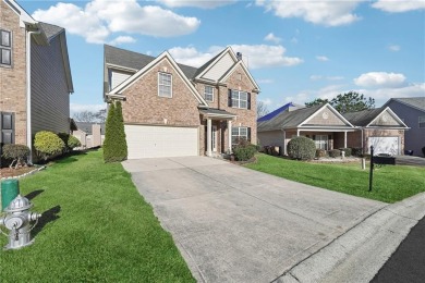 Welcome to this charming and fully renovated 4-bedroom, 2.5-bath on Chateau Elan Golf Club  in Georgia - for sale on GolfHomes.com, golf home, golf lot