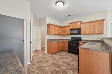 Welcome to this charming and fully renovated 4-bedroom, 2.5-bath on Chateau Elan Golf Club  in Georgia - for sale on GolfHomes.com, golf home, golf lot