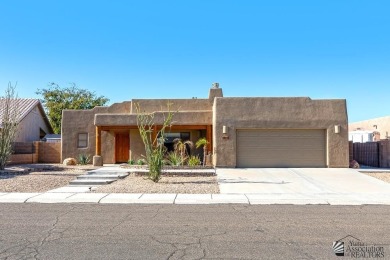 Beautiful custom Santa Fe style home on the golf course in Mesa on Mesa Del Sol Golf Club in Arizona - for sale on GolfHomes.com, golf home, golf lot