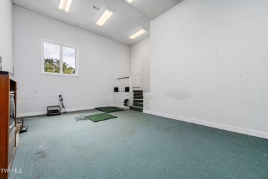 Stunning Custom Home with Long-Range Mountain Views on the on Ridges Golf and Country Club in Tennessee - for sale on GolfHomes.com, golf home, golf lot