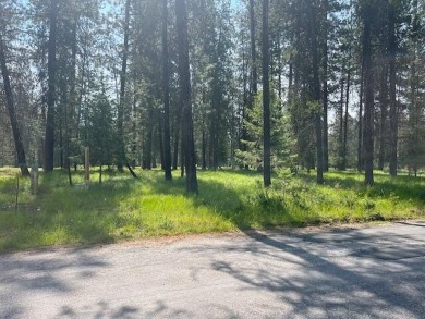 Don't miss this opportunity to own a perfectly located timbered on Chewelah Golf and Country Club  in Washington - for sale on GolfHomes.com, golf home, golf lot