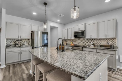 Welcome to this exceptional home in the Ways Station Community on Sterling Links Golf Club in Georgia - for sale on GolfHomes.com, golf home, golf lot