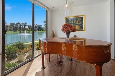 Step into this beautiful ground-floor condo at Desert Island on Desert Island Golf and Country Club in California - for sale on GolfHomes.com, golf home, golf lot