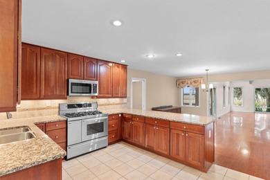 Lovely contemporary style home here at 75 Duckpond Place in on Wedgefield Plantation Golf Club in South Carolina - for sale on GolfHomes.com, golf home, golf lot