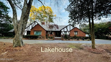 Beautifully refreshed and move-in ready! This stunning lakefront on Walnut Creek Country Club in North Carolina - for sale on GolfHomes.com, golf home, golf lot