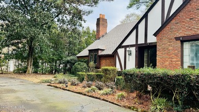 Beautifully refreshed and move-in ready! This stunning lakefront on Walnut Creek Country Club in North Carolina - for sale on GolfHomes.com, golf home, golf lot