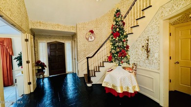 Beautifully refreshed and move-in ready! This stunning lakefront on Walnut Creek Country Club in North Carolina - for sale on GolfHomes.com, golf home, golf lot