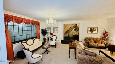 Beautifully refreshed and move-in ready! This stunning lakefront on Walnut Creek Country Club in North Carolina - for sale on GolfHomes.com, golf home, golf lot