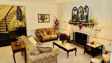 Beautifully refreshed and move-in ready! This stunning lakefront on Walnut Creek Country Club in North Carolina - for sale on GolfHomes.com, golf home, golf lot