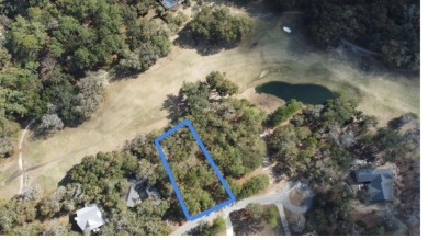 This .67 acre lot in gated Sutherland Bluff Plantation is in a on Sapelo Hammock Golf Club in Georgia - for sale on GolfHomes.com, golf home, golf lot