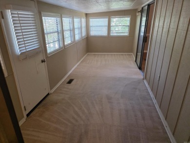 Cozy 2 bedroom with lots of space and a large garage. Just a few on Mountain Ranch Golf Club in Arkansas - for sale on GolfHomes.com, golf home, golf lot