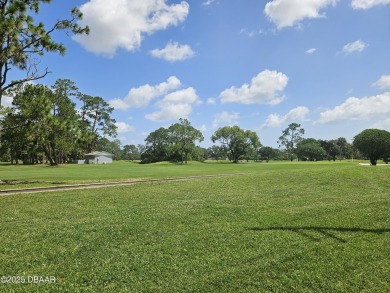 Spacious and versatile, this nearly 3,000 sq ft home is perfect on Riviera Country Club in Florida - for sale on GolfHomes.com, golf home, golf lot