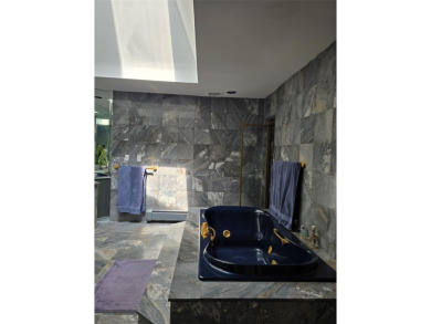 A GRANITE STONE MANSION FULL OF NATURAL SUNLIGHT / CUSTOM BUILT on Lake Success Golf Club in New York - for sale on GolfHomes.com, golf home, golf lot
