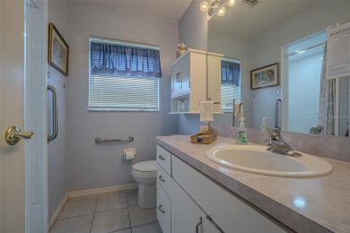 Live the RESORT Lifestyle in this updated 2-bedroom, 2-bath home on Tampa Bay Golf and Country Club in Florida - for sale on GolfHomes.com, golf home, golf lot