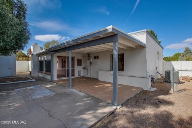 This light-filled 2-bedroom, 1-bathroom home offers stunning on Quail Creek Country Club  in Arizona - for sale on GolfHomes.com, golf home, golf lot