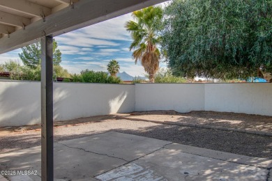 This light-filled 2-bedroom, 1-bathroom home offers stunning on Quail Creek Country Club  in Arizona - for sale on GolfHomes.com, golf home, golf lot