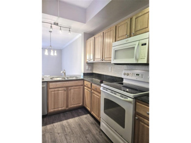 Motivated seller!  Two bedroom two bath townhome  in the popular on The Meadows Golf and Country Club in Florida - for sale on GolfHomes.com, golf home, golf lot