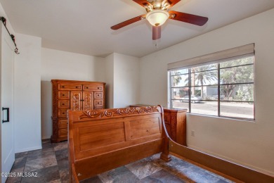 This light-filled 2-bedroom, 1-bathroom home offers stunning on Quail Creek Country Club  in Arizona - for sale on GolfHomes.com, golf home, golf lot