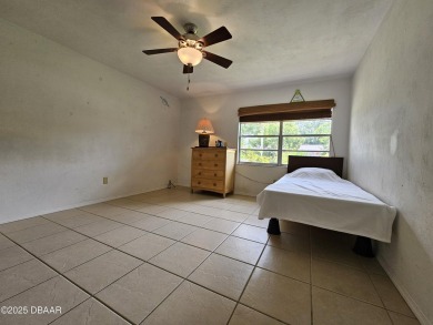 Spacious and versatile, this nearly 3,000 sq ft home is perfect on Riviera Country Club in Florida - for sale on GolfHomes.com, golf home, golf lot