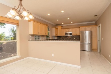 Set In A Quiet Cul-de-sac,This 3-bedroom,2.5-bath Lakefront Home on Marsh Creek Country Club in Florida - for sale on GolfHomes.com, golf home, golf lot