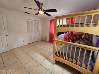 Spacious and versatile, this nearly 3,000 sq ft home is perfect on Riviera Country Club in Florida - for sale on GolfHomes.com, golf home, golf lot