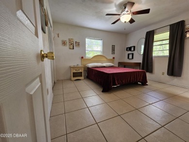 Spacious and versatile, this nearly 3,000 sq ft home is perfect on Riviera Country Club in Florida - for sale on GolfHomes.com, golf home, golf lot
