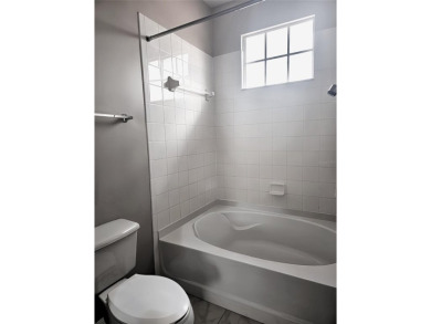 Motivated seller!  Two bedroom two bath townhome  in the popular on The Meadows Golf and Country Club in Florida - for sale on GolfHomes.com, golf home, golf lot