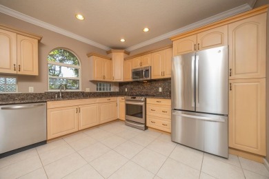 Set In A Quiet Cul-de-sac,This 3-bedroom,2.5-bath Lakefront Home on Marsh Creek Country Club in Florida - for sale on GolfHomes.com, golf home, golf lot