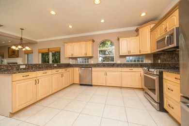 Set In A Quiet Cul-de-sac,This 3-bedroom,2.5-bath Lakefront Home on Marsh Creek Country Club in Florida - for sale on GolfHomes.com, golf home, golf lot