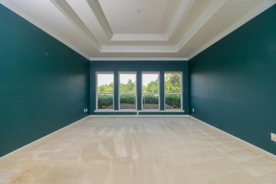Set In A Quiet Cul-de-sac,This 3-bedroom,2.5-bath Lakefront Home on Marsh Creek Country Club in Florida - for sale on GolfHomes.com, golf home, golf lot