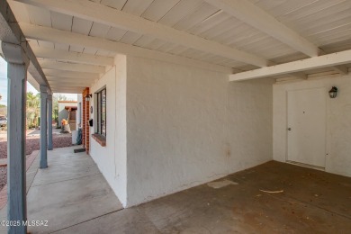 This light-filled 2-bedroom, 1-bathroom home offers stunning on Quail Creek Country Club  in Arizona - for sale on GolfHomes.com, golf home, golf lot