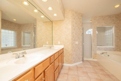 Set In A Quiet Cul-de-sac,This 3-bedroom,2.5-bath Lakefront Home on Marsh Creek Country Club in Florida - for sale on GolfHomes.com, golf home, golf lot