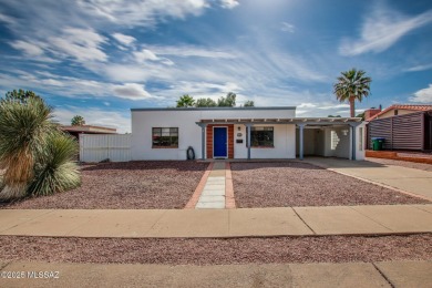 This light-filled 2-bedroom, 1-bathroom home offers stunning on Quail Creek Country Club  in Arizona - for sale on GolfHomes.com, golf home, golf lot