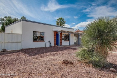 This light-filled 2-bedroom, 1-bathroom home offers stunning on Quail Creek Country Club  in Arizona - for sale on GolfHomes.com, golf home, golf lot