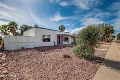 This light-filled 2-bedroom, 1-bathroom home offers stunning on Quail Creek Country Club  in Arizona - for sale on GolfHomes.com, golf home, golf lot