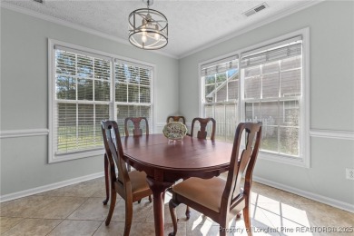 Welcome to 4511 BlueBush Drive-A Comfortable Ranch Retreat in on Baywood Golf Club in North Carolina - for sale on GolfHomes.com, golf home, golf lot