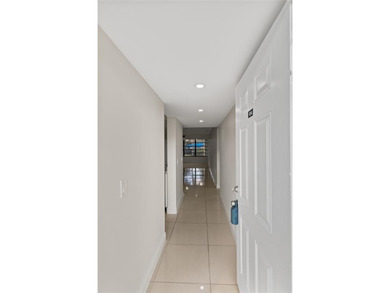 Beautiful 2-bedroom, 2-bathroom condo with a versatile bonus on Pine Island Ridge Country Club in Florida - for sale on GolfHomes.com, golf home, golf lot