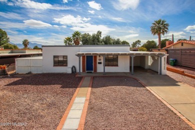 This light-filled 2-bedroom, 1-bathroom home offers stunning on Quail Creek Country Club  in Arizona - for sale on GolfHomes.com, golf home, golf lot