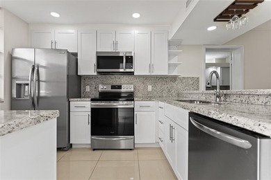 Beautiful 2-bedroom, 2-bathroom condo with a versatile bonus on Pine Island Ridge Country Club in Florida - for sale on GolfHomes.com, golf home, golf lot
