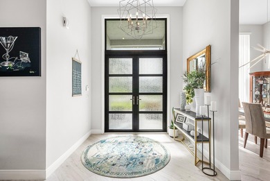 This stunning, updated home blends modern style with everyday on Stonebridge Golf and Country Club in Florida - for sale on GolfHomes.com, golf home, golf lot