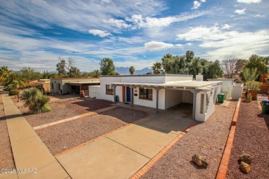 This light-filled 2-bedroom, 1-bathroom home offers stunning on Quail Creek Country Club  in Arizona - for sale on GolfHomes.com, golf home, golf lot