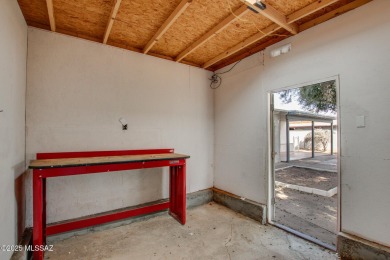 This light-filled 2-bedroom, 1-bathroom home offers stunning on Quail Creek Country Club  in Arizona - for sale on GolfHomes.com, golf home, golf lot