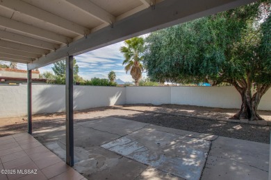 This light-filled 2-bedroom, 1-bathroom home offers stunning on Quail Creek Country Club  in Arizona - for sale on GolfHomes.com, golf home, golf lot