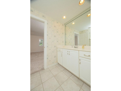 Set In A Quiet Cul-de-sac,This 3-bedroom,2.5-bath Lakefront Home on Marsh Creek Country Club in Florida - for sale on GolfHomes.com, golf home, golf lot