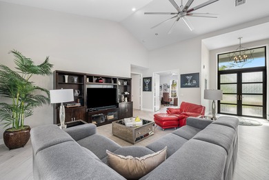 This stunning, updated home blends modern style with everyday on Stonebridge Golf and Country Club in Florida - for sale on GolfHomes.com, golf home, golf lot