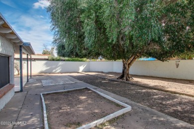 This light-filled 2-bedroom, 1-bathroom home offers stunning on Quail Creek Country Club  in Arizona - for sale on GolfHomes.com, golf home, golf lot