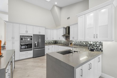 This stunning, updated home blends modern style with everyday on Stonebridge Golf and Country Club in Florida - for sale on GolfHomes.com, golf home, golf lot