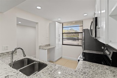 Beautiful 2-bedroom, 2-bathroom condo with a versatile bonus on Pine Island Ridge Country Club in Florida - for sale on GolfHomes.com, golf home, golf lot